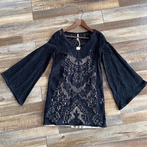 Spell Design black lace mini dress with nude slip